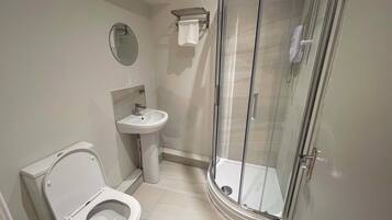 Shower, free toiletries, hair dryer, towels