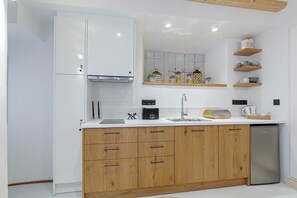 Fridge, coffee/tea maker, electric kettle, toaster