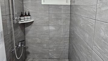 Hair dryer, towels, soap, toilet paper