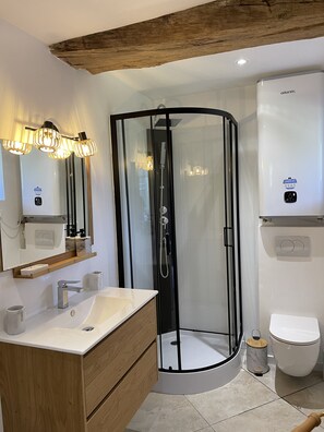 Shower, hair dryer, towels, soap