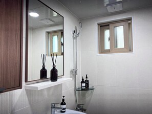 Hair dryer, towels, soap, toilet paper