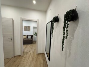 Signature Apartment, Patio, Courtyard View | Living area | Flat-screen TV - NG Collection il Barbagia (Alghero)