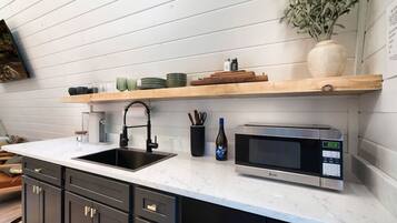 Fridge, microwave, stovetop, coffee/tea maker