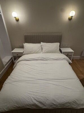 1 غرفة نوم ومكواة/لوح كي وواي فاي وملاءات أسرّة