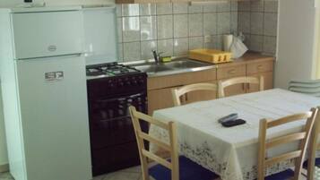 Apartment (One Bedroom Apartment (BIG - yard)) | Private kitchen | Fridge