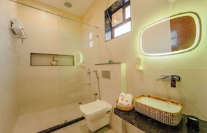 Shower, free toiletries, towels, soap