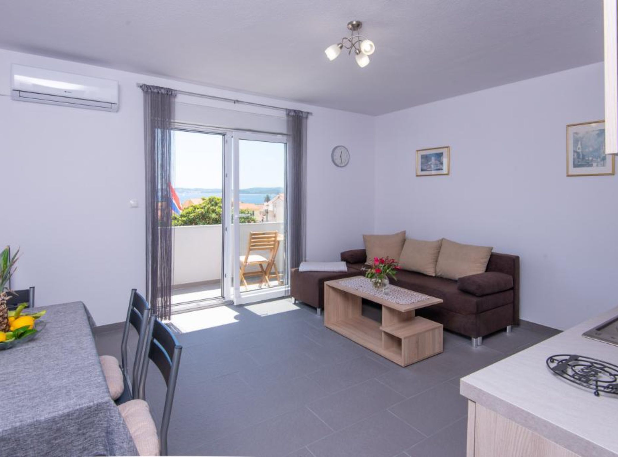 Apartment (One Bedroom Apartment with Balcony an) | Living room | 32-inch flat-screen TV with satellite channels