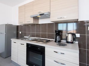 Apartment (One Bedroom Apartment with Balcony an) | Private kitchen | Fridge