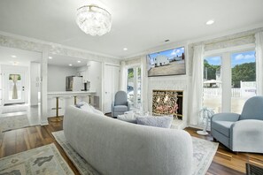 Smart TV, fireplace, books
