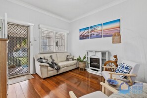 TV, fireplace, books, stereo