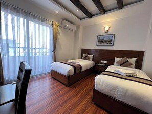 Deluxe Twin Room, City View | Desk, laptop workspace, free WiFi