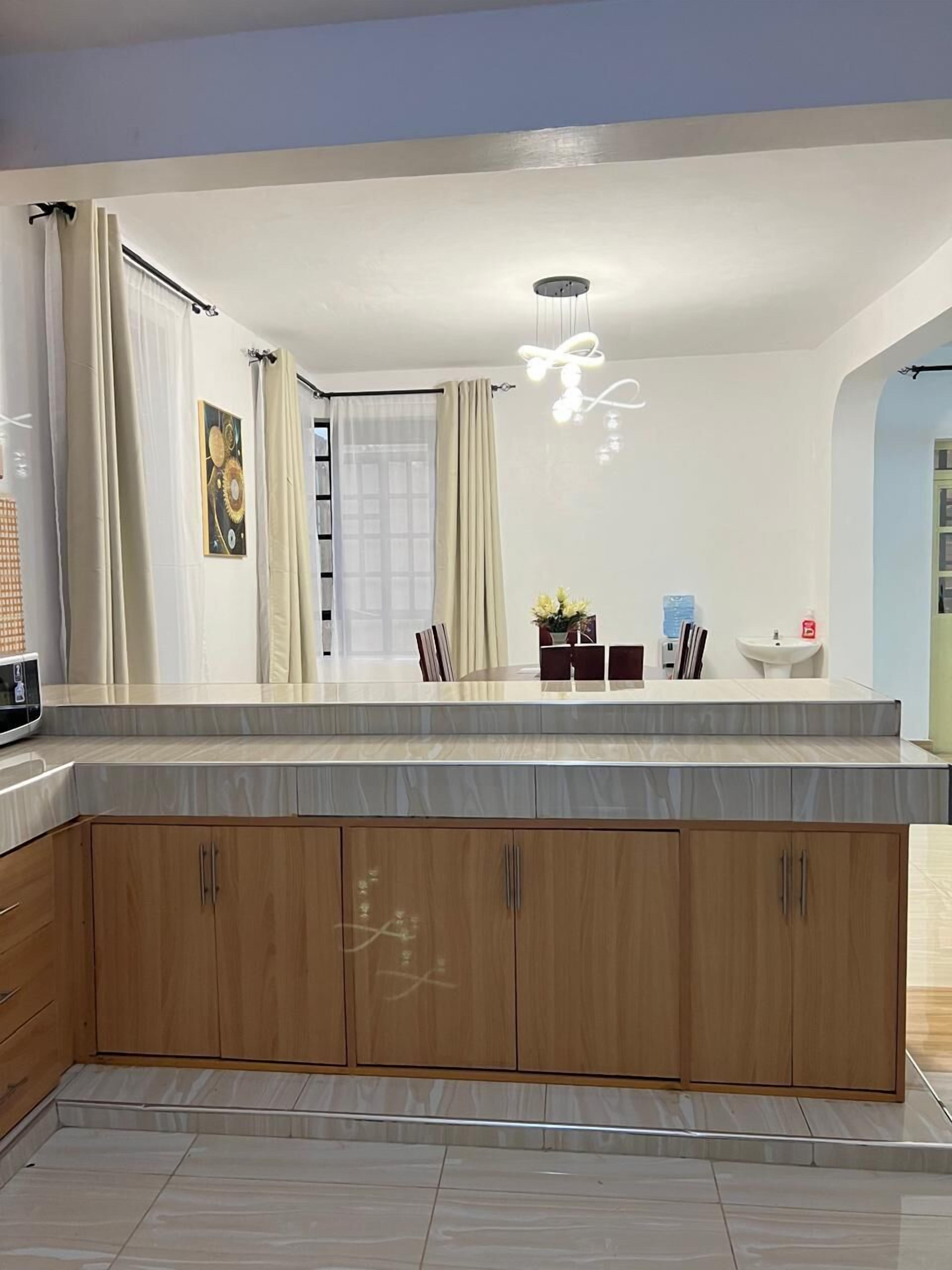 Deluxe-Apartment, Gartenblick | Eigene Küche