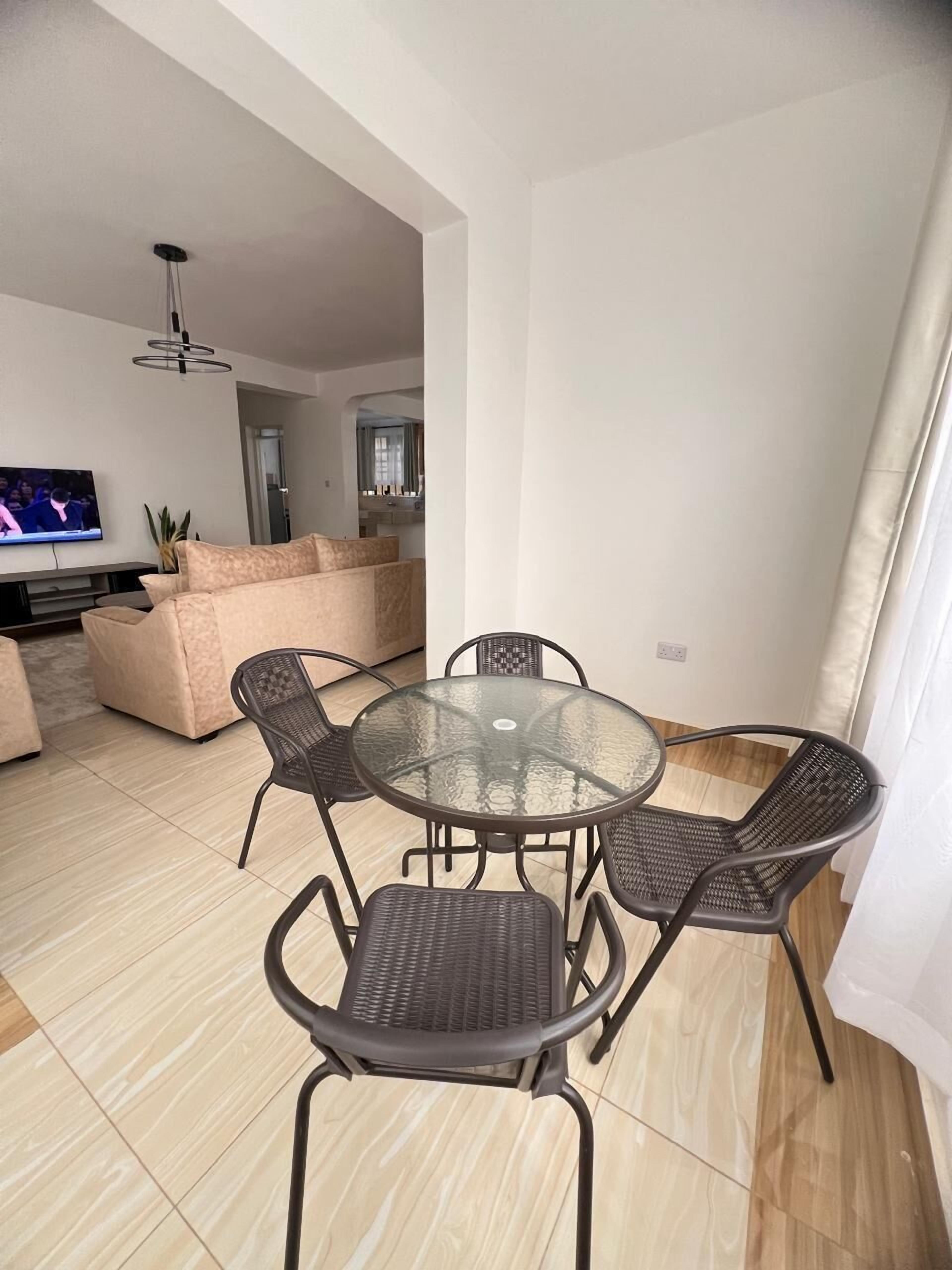 Deluxe Apartment, Garden View | Living area