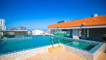 Outdoor pool, open 8:30 AM to 10:30 PM, pool umbrellas, pool loungers