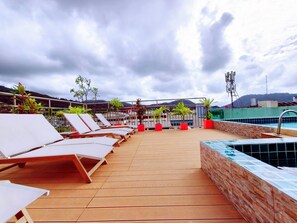 Outdoor pool, open 8:30 AM to 10:30 PM, pool umbrellas, pool loungers