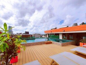 Outdoor pool, open 8:30 AM to 10:30 PM, pool umbrellas, pool loungers