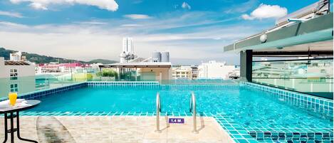Outdoor pool, open 8:30 AM to 10:30 PM, pool umbrellas, pool loungers