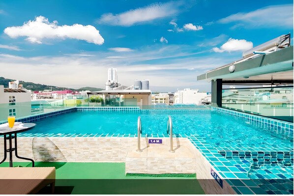 Outdoor pool, open 8:30 AM to 10:30 PM, pool umbrellas, pool loungers