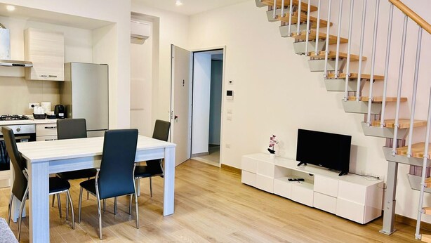 Deluxe Apartment | Living area | TV - SMART SUITES FORLI  (Forlì)