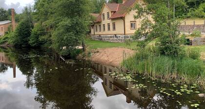Historic apartment by Mörrumsån with its own jetty
