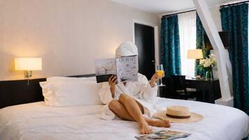 Literie de qualité supérieure, coffres-forts dans les chambres, bureau