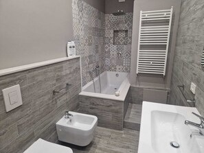 Hair dryer, bidet, towels, soap