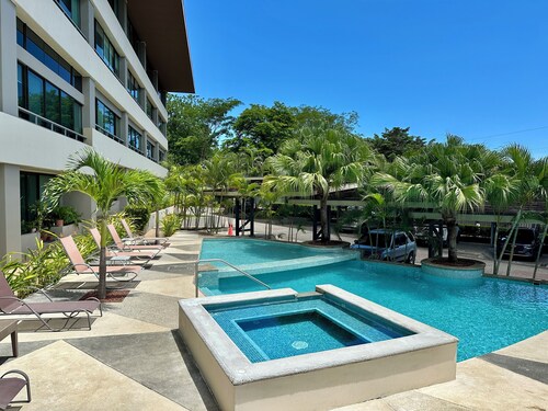 Exceptional three-bedroom, two-and-a-half-bathroom ground floor condo