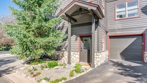 A two-story house with a stone foundation, a front porch, and a garage. - 8 Mi to Copper Mtn: Frisco Home w/ Shuttle Access (Frisco)
