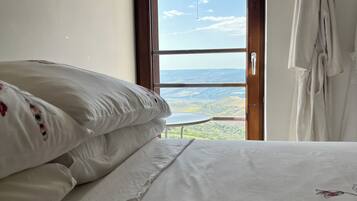 2 dormitorios, tabla de planchar con plancha, Internet y ropa de cama