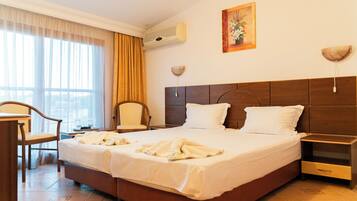 Double Room, Partial Sea View | Desk, laptop workspace, free WiFi