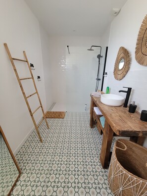Shower, hair dryer, towels, soap