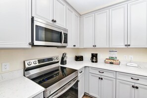 Condo, 4 Bedrooms | Private kitchen - Paradise Breeze Cottage By Shine Villas Margaritaville Resort Orlando 4 Bedroom Condo (Kissimmee)