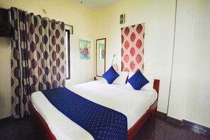 Deluxe Double Room, Balcony, City View | Desk, laptop workspace, soundproofing, iron/ironing board - Mystic Felicity Inn (Bengaluru)