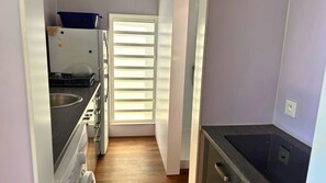 Fridge, microwave, electric kettle, cookware/dishes/utensils