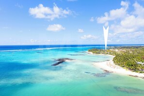 On the beach, sun-loungers, beach towels