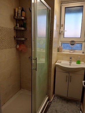 Hair dryer, towels, soap, toilet paper
