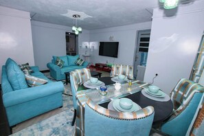 Deluxe Apartment | Living area | 34-inch Smart TV with digital channels - Lux Suites Mungai Heights Naivasha (Naivasha)