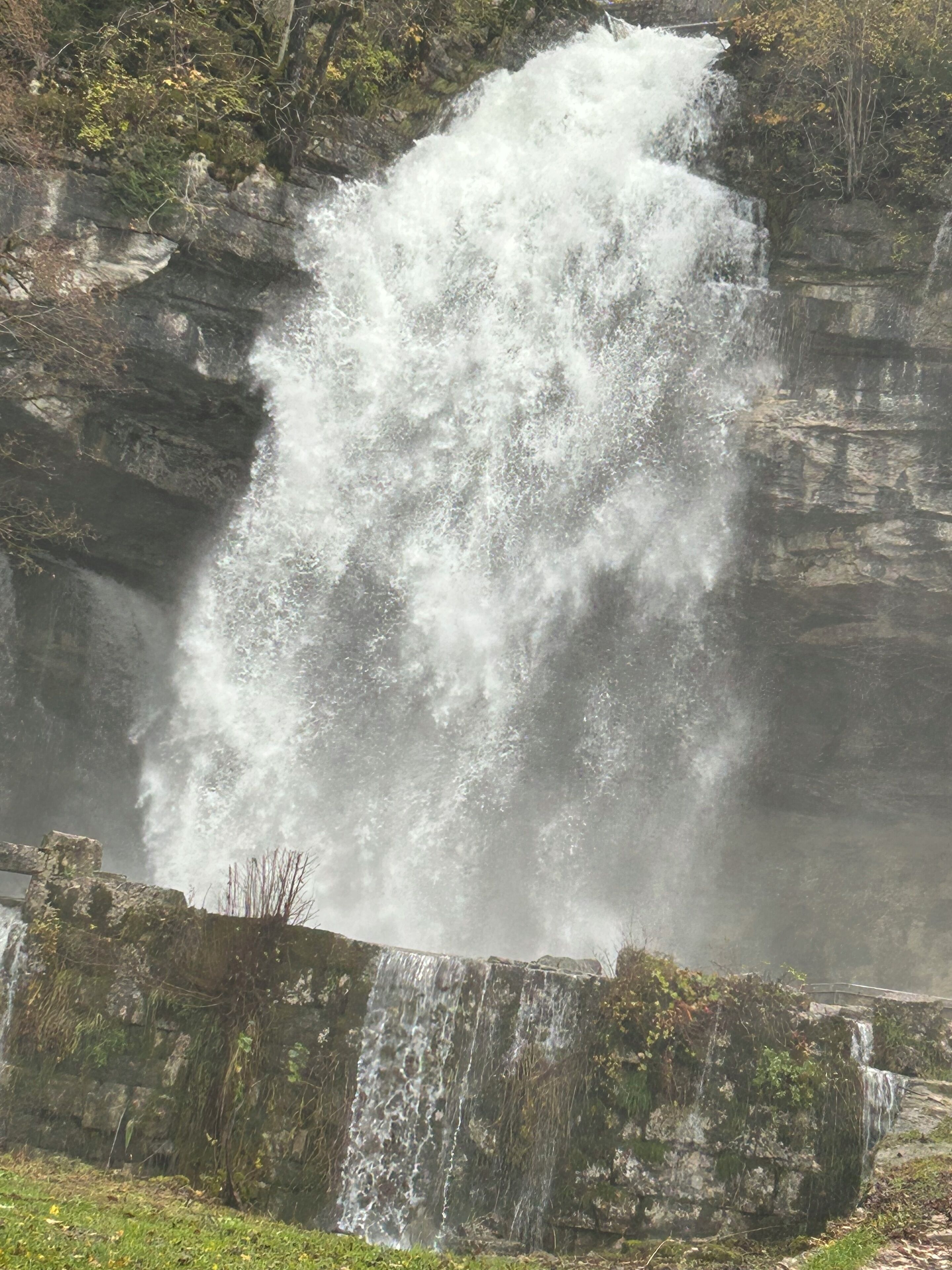A waterfall cascading down a rocky cliff.