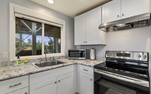 Fridge, microwave, coffee/tea maker, toaster
