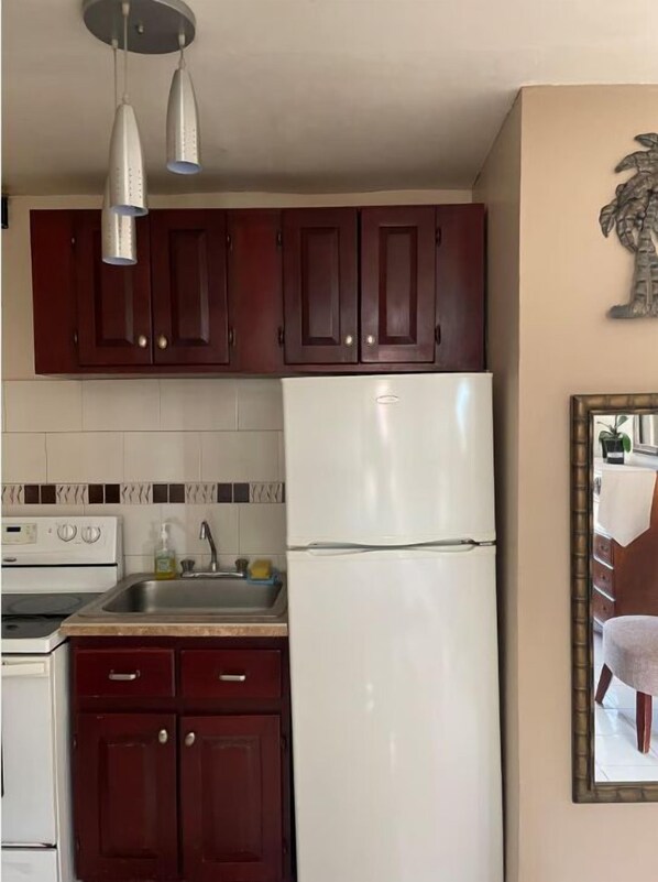 Estúdio, sacada | Cozinha privada