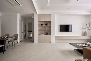 32-inch flat-screen TV with cable channels - Hoang Dung Apartment by THC Group (Ho Chi Minh)
