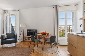 City Apartment, 1 Double Bed with Sofa bed, Non Smoking | Living area | 40-inch Smart TV with satellite channels - Charming 1BR in Le Marais - Bretagne (Paris)