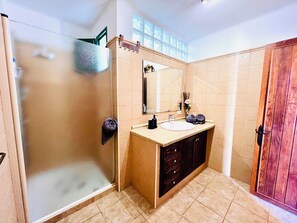 Shower, hair dryer, towels, soap