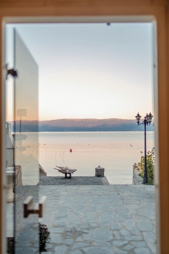 Romantic lakeside villa with a private beach and sauna!