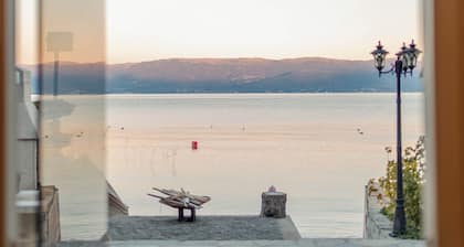 Romantic lakeside villa with a private beach and sauna!