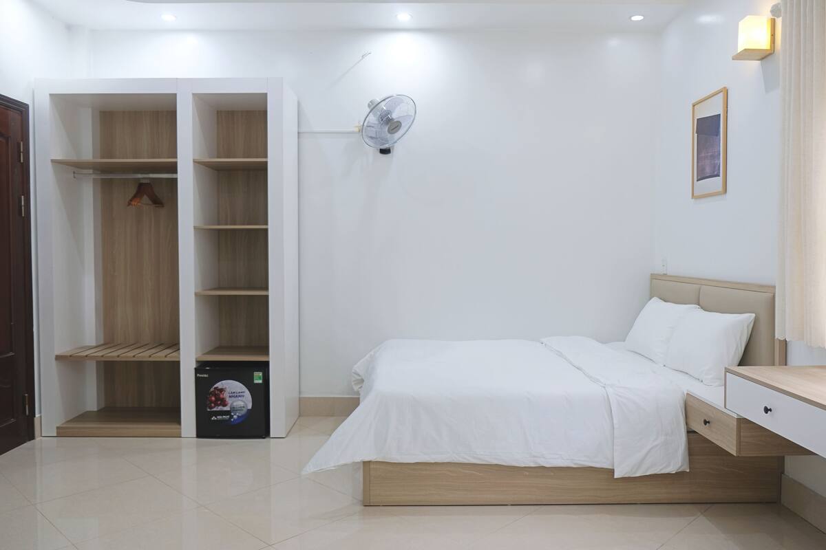 Habitación cuádruple familiar, 2 camas Queen size | Escritorio, espacio para trabajar con laptop y wifi gratis