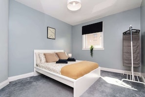 3 bedrooms, iron/ironing board, travel cot, WiFi