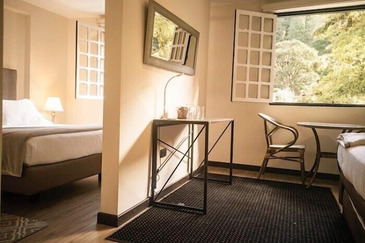 Deluxe Quadruple Room | Premium bedding, minibar, free WiFi, bed sheets