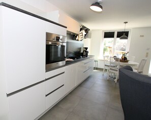 Apartamento | Cocina privada | Trona infantil