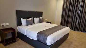 Habitación ejecutiva, vista a la ciudad | Insonorización, wifi gratis y ropa de cama